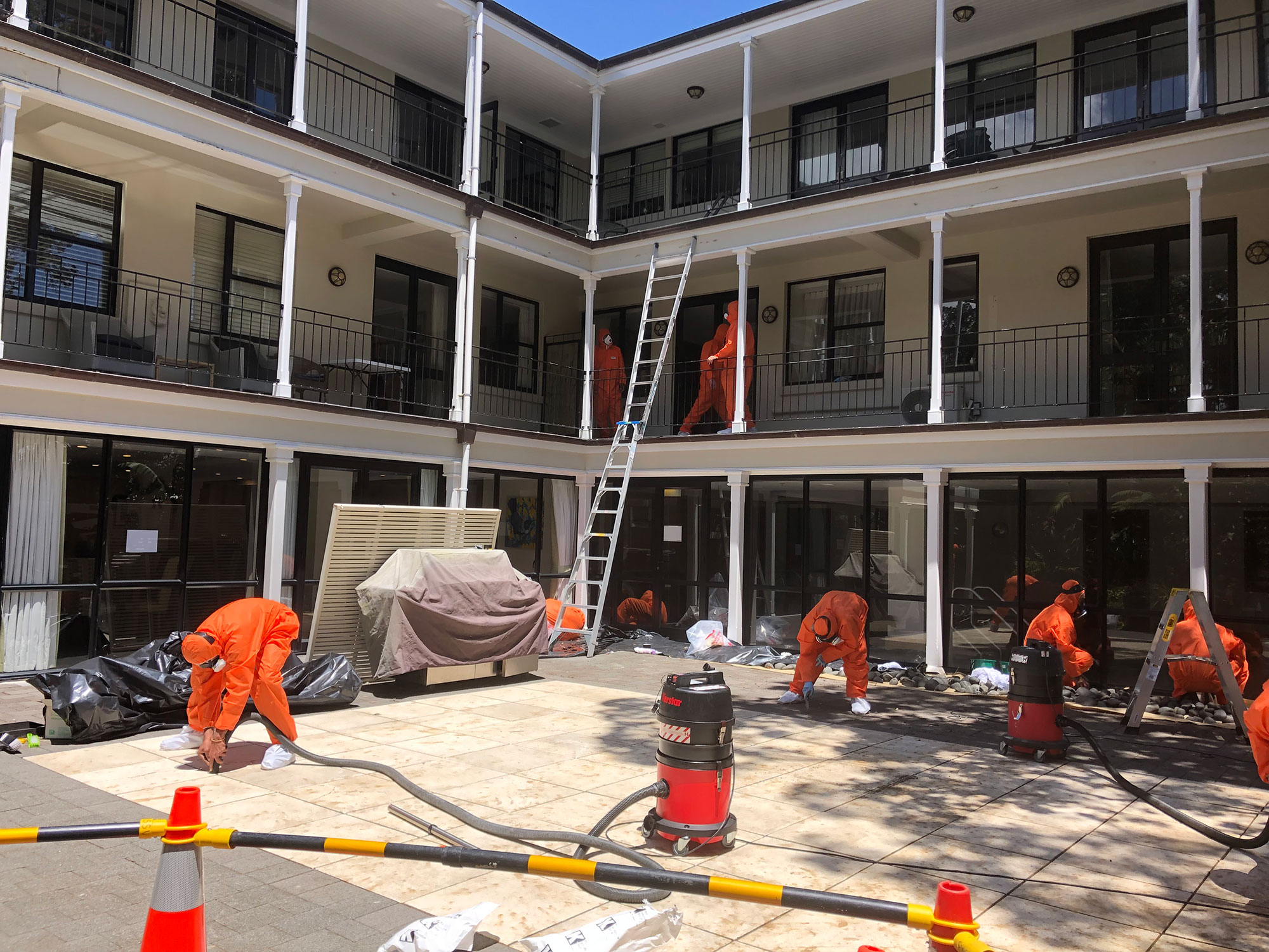 Pre clean of the exterior courtyard prior to decontamination - Aged care facility Asbestos Decontamination