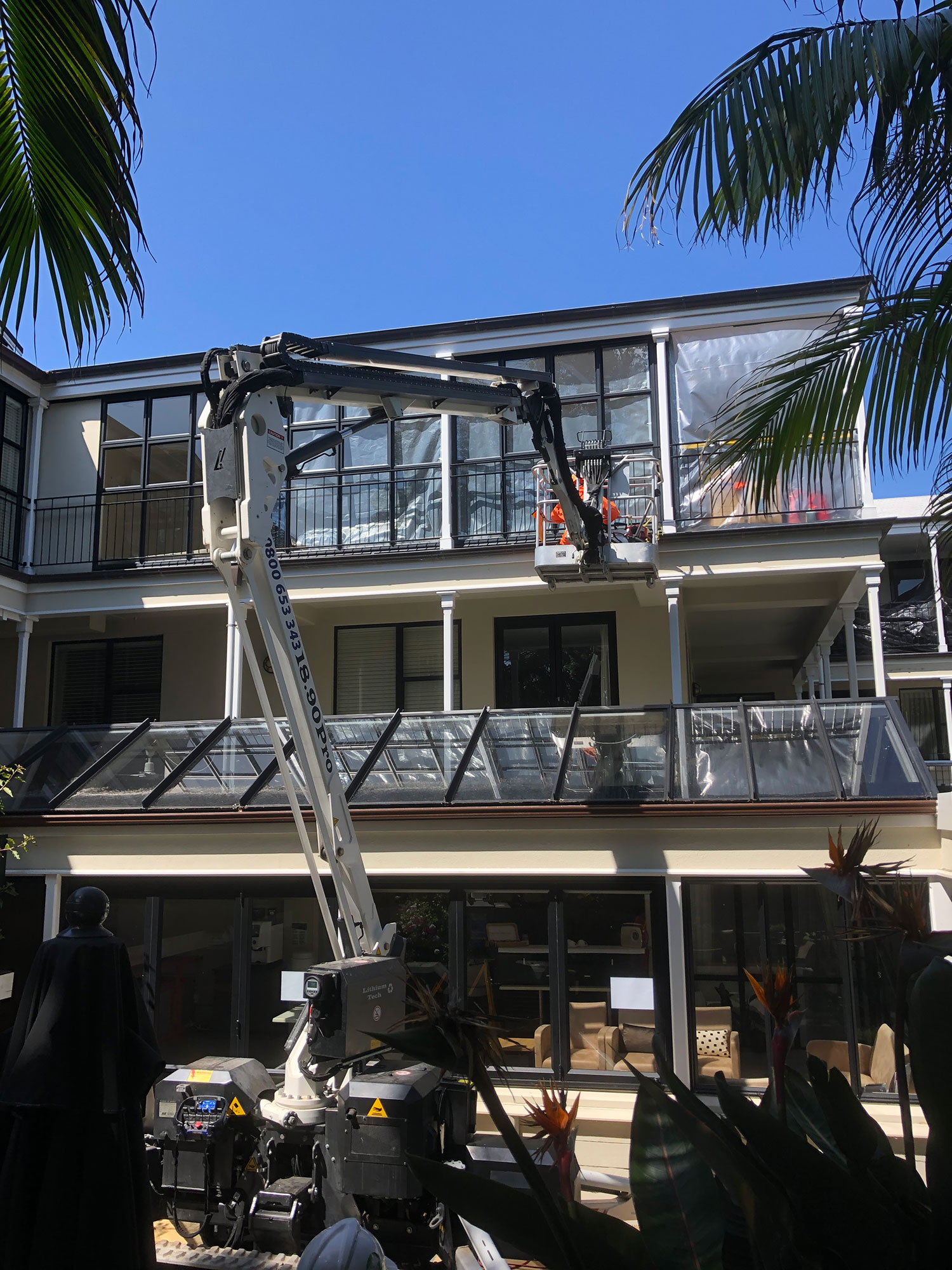 sealing off exterior verandas by spider boom - Aged care facility Asbestos Decontamination